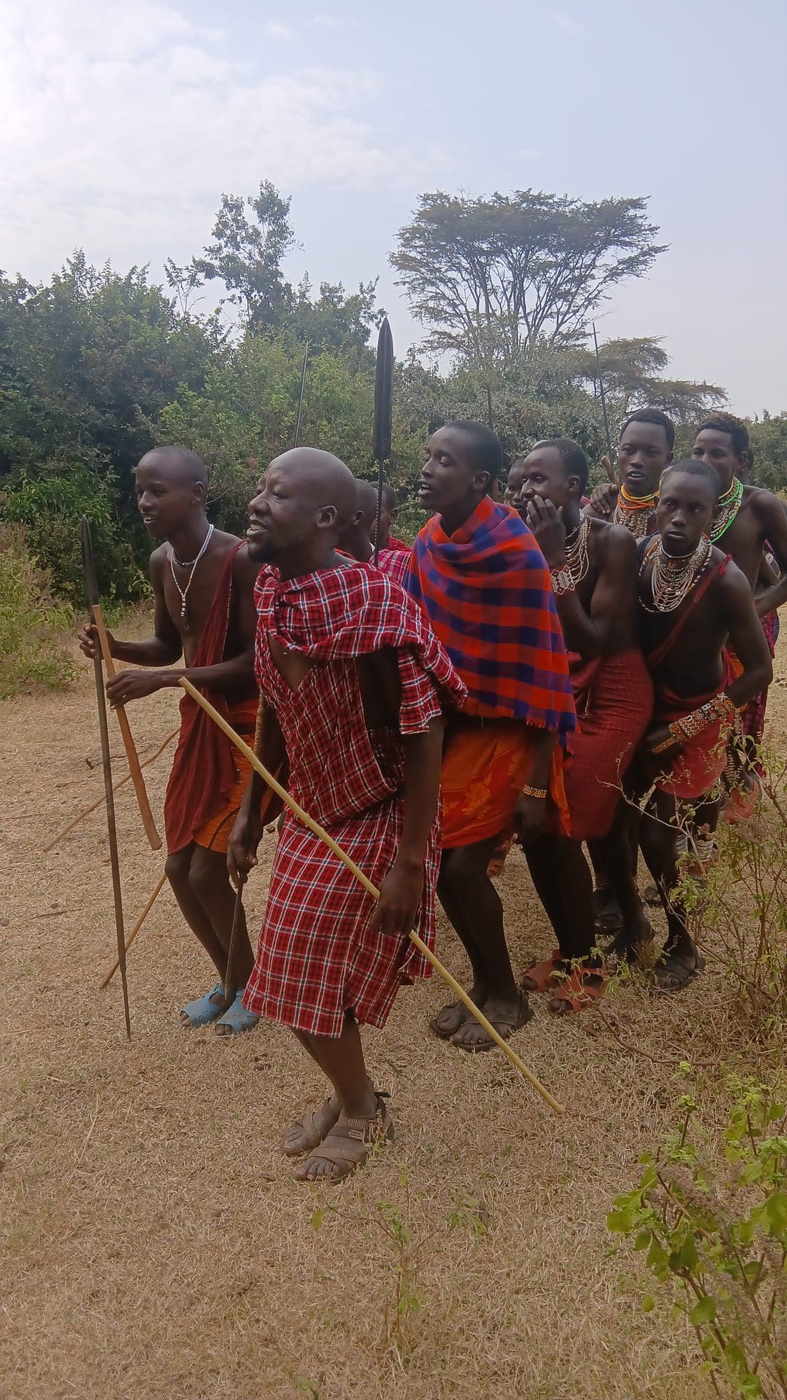 Maasai men performing a traditional dance