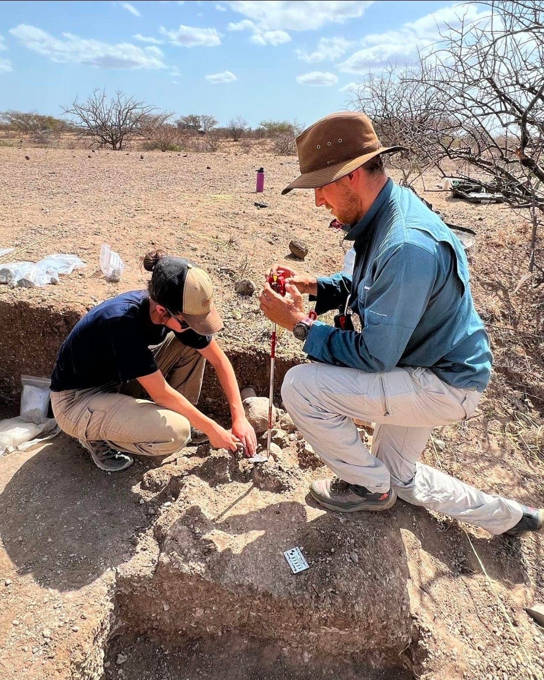 Two researchers excavating a site in the Turkana Basin